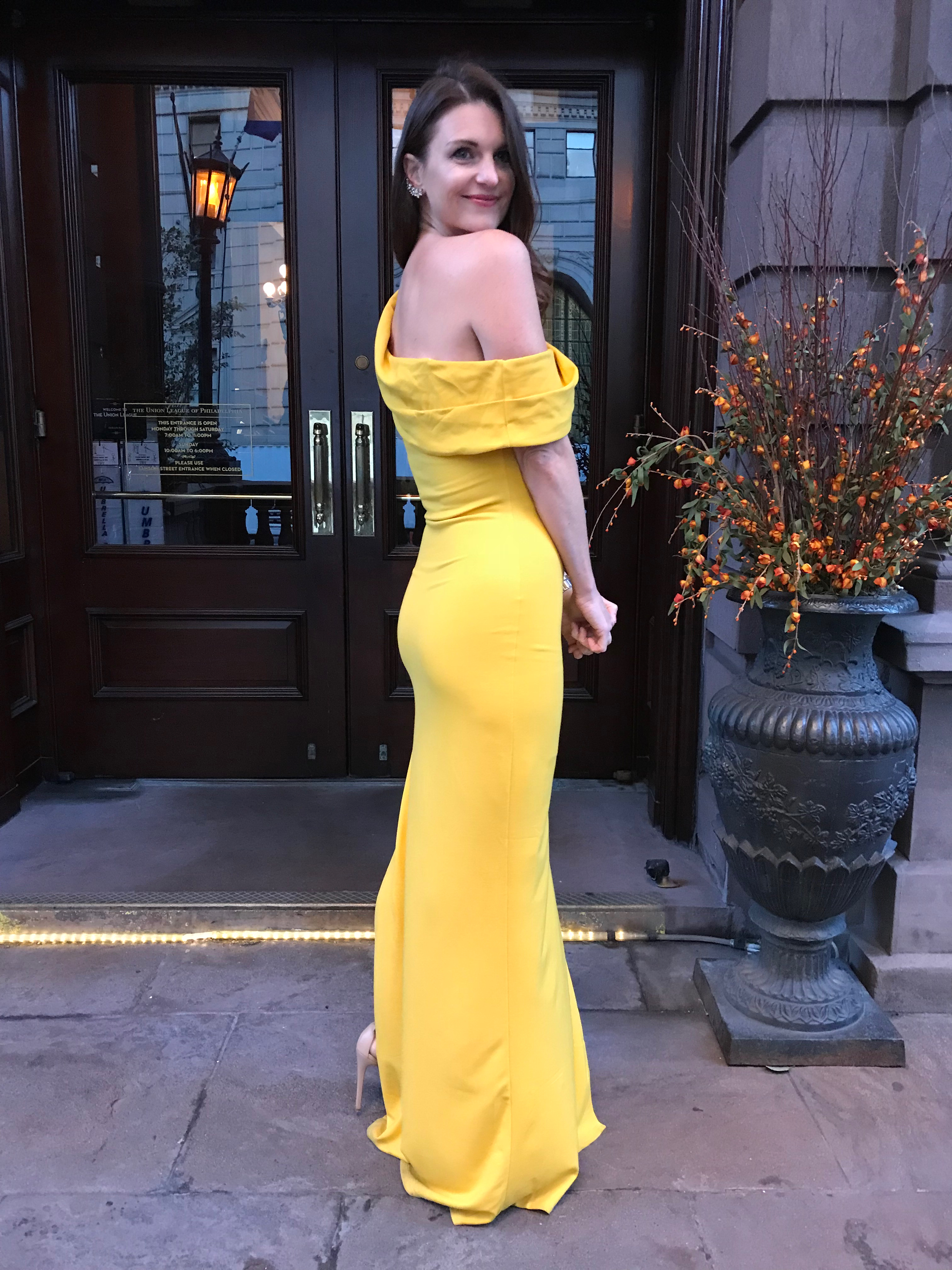 black tie wedding look: yellow dress