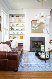 living room reveal. Interior design. living room design. modern living room. fireplace mantle design. book shelf styling