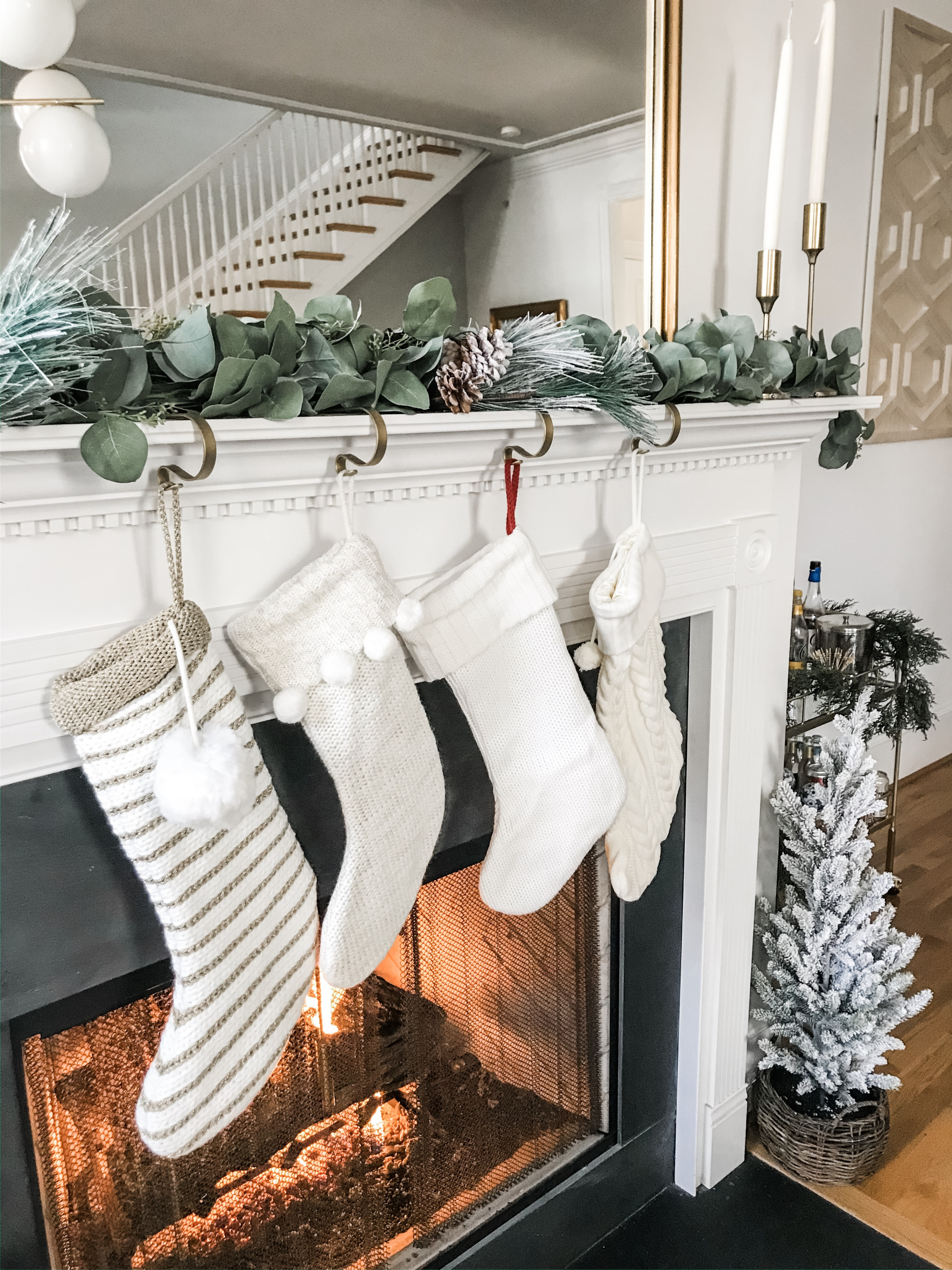 Christmas living room decor, stocking on the fireplace, mantle decor for christmas