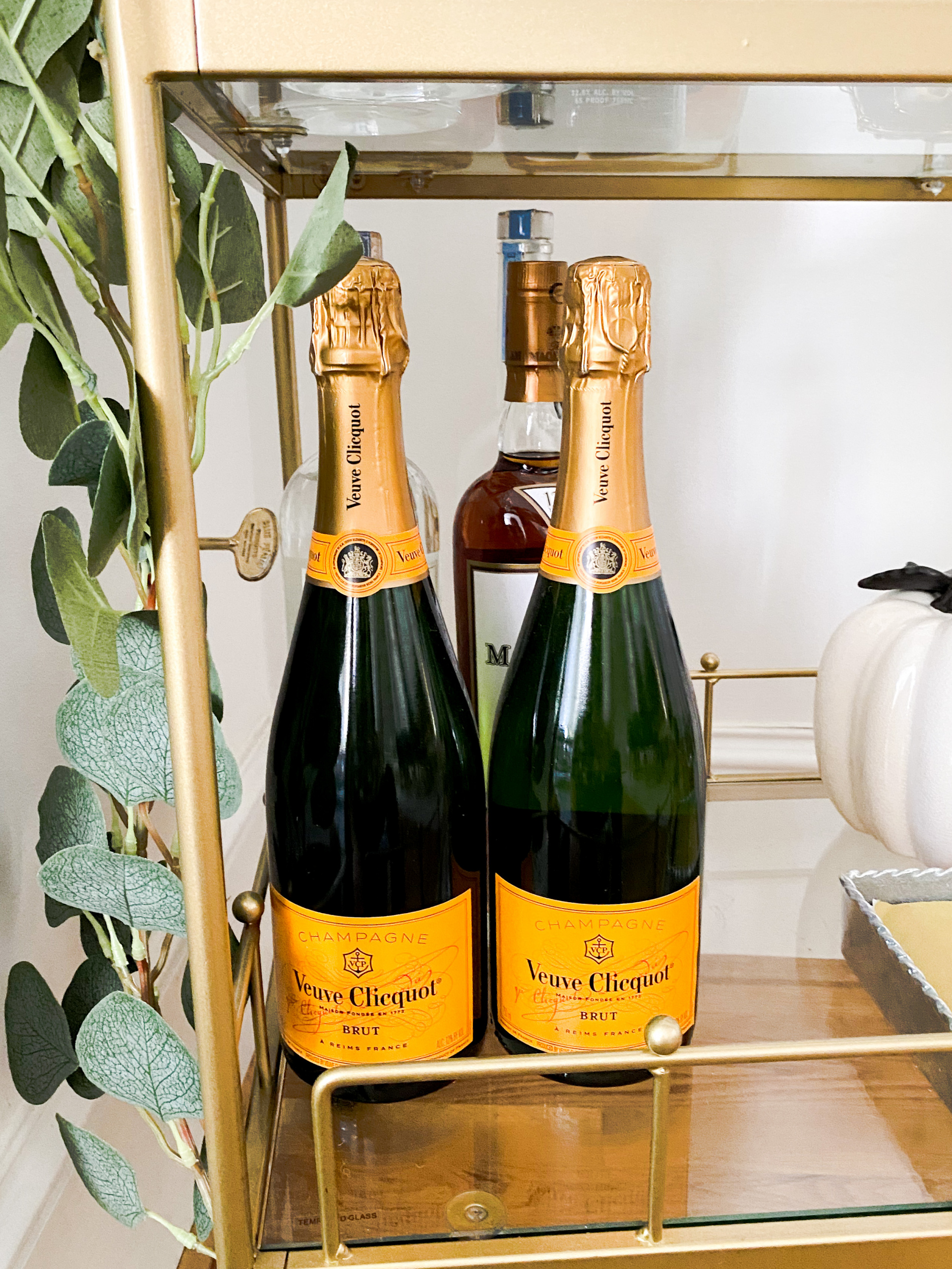 Decorating with champagne bottle, hosting for the holidays, fall bar cart style, tips for hosting guests for thanksgiving 