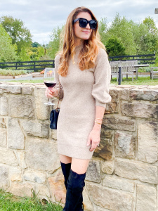 Fall sweater dress outfits. Sweater dress and black high knee boots, salamander resort and spa, fall outfit ideas, fall dress ideas, finding beauty mom outfit ideas for fall and thanksgiving, what to wear to a wine vineyard